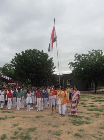 Hoisting of the flag by The Principal